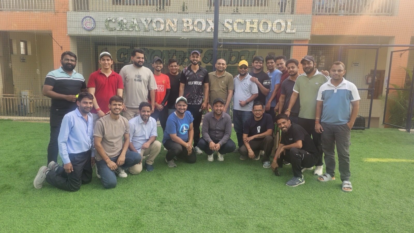 Parents, educators, and leadership gathered for community sports and partnership day at Crayon Box School